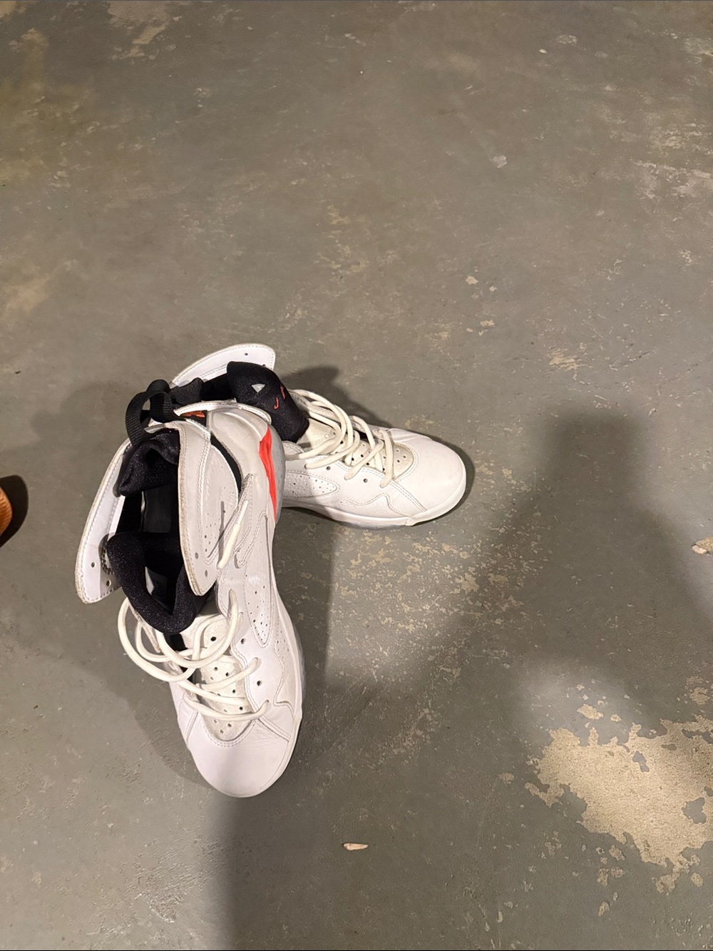 Jordan White High-Top Sneakers with Black Liner and Red Accent